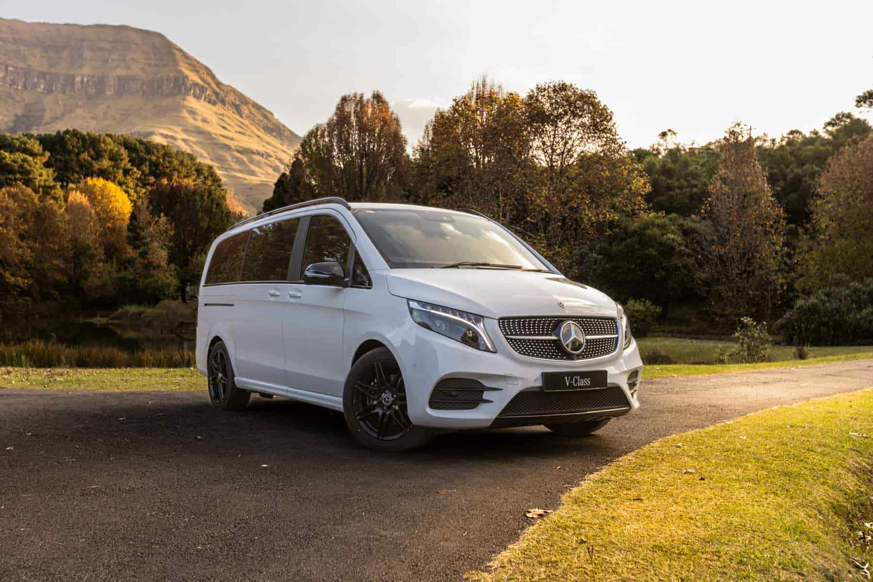KesCab Taxi Mercedes sedan parked outside modern Cyprus building